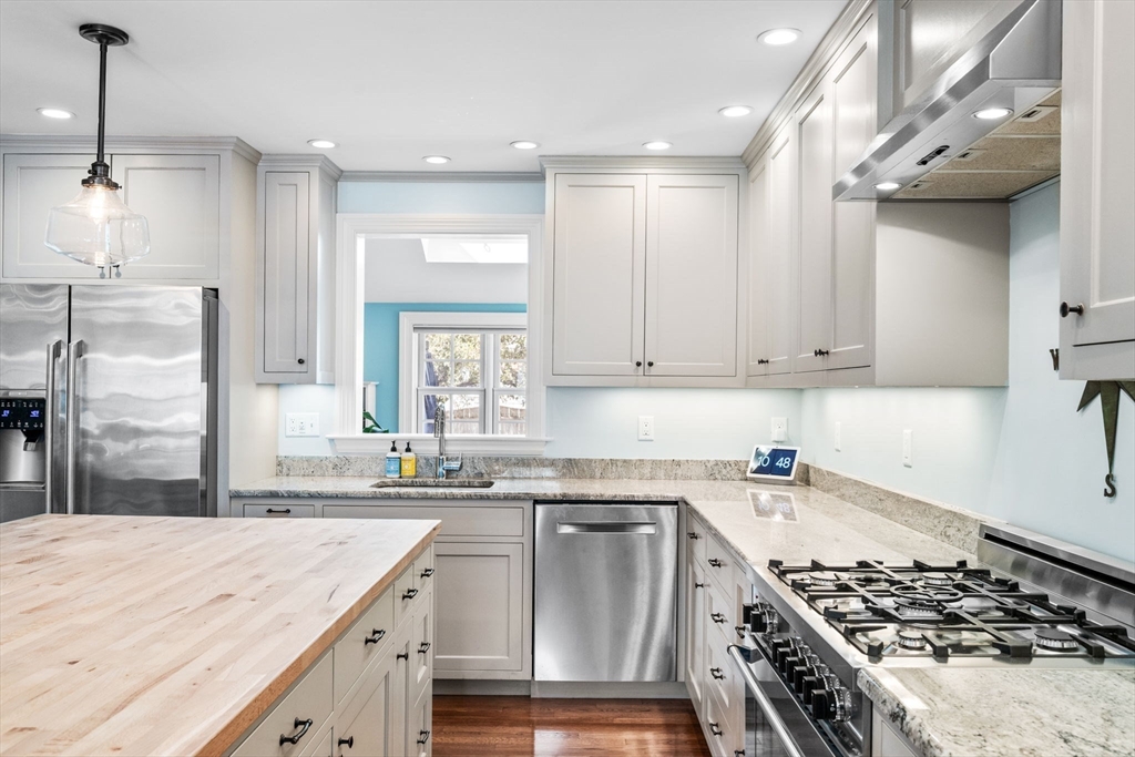 9 Sevinor Road Marblehead, MA 01945 - Photo 8 of 39 a kitchen with stainless steel appliances granite countertop a sink stove and refrigerator
