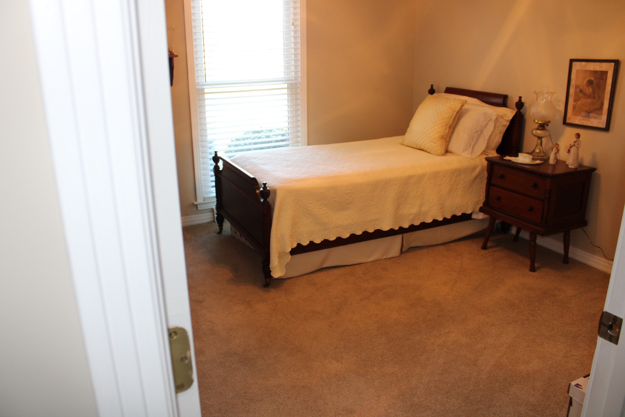 229 Oakland Drive Sparta, TN 38583 - Photo 19 of 26 a bedroom with a bed and a window