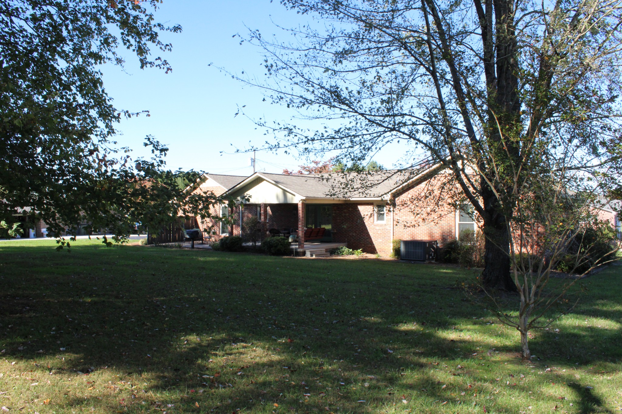 229 Oakland Drive Sparta, TN 38583 - Photo 4 of 26 a view of a trees in front of a house