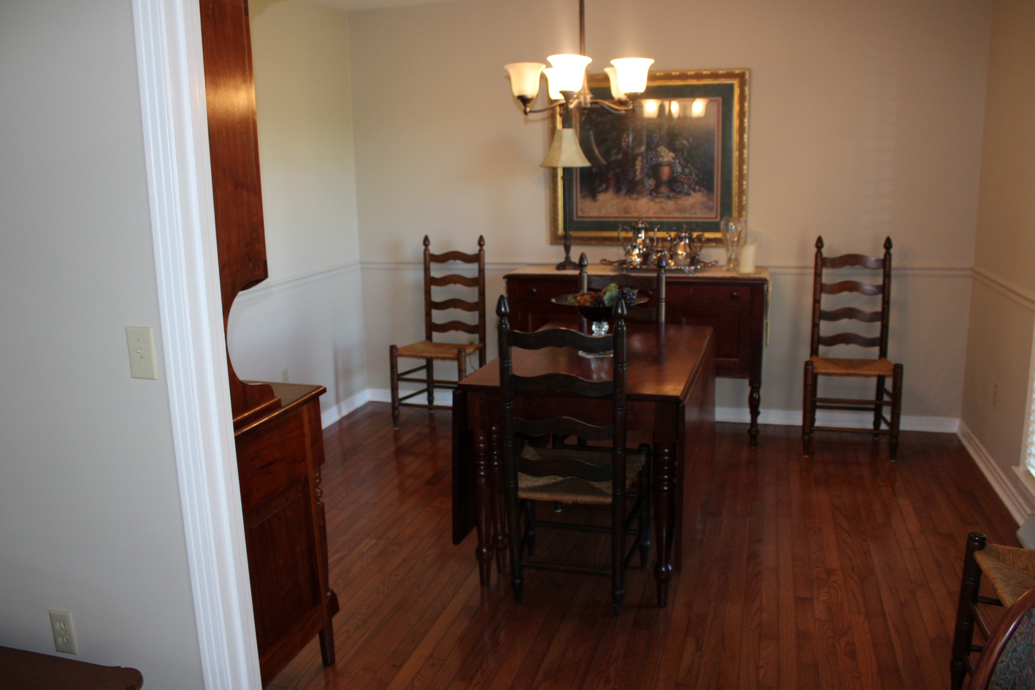 229 Oakland Drive Sparta, TN 38583 - Photo 10 of 26 a view of a dining room with furniture and wooden floor