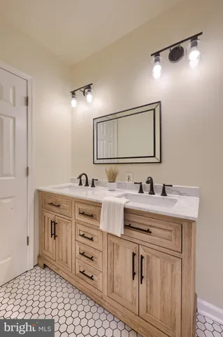 a bathroom with a shower curtain and a tub