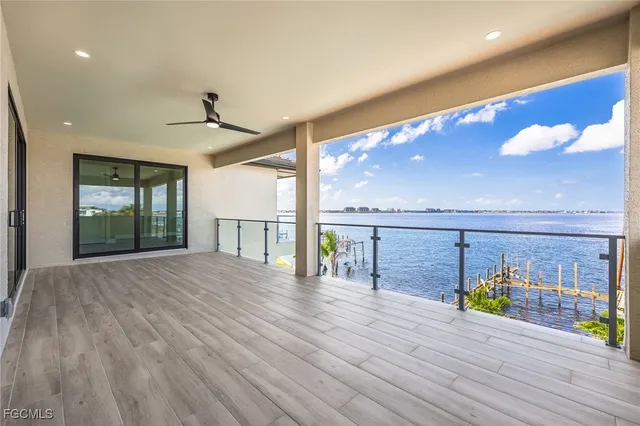 a view of a patio with swimming pool