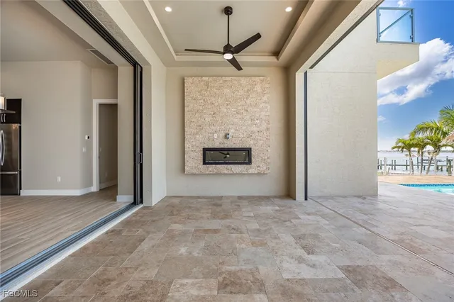 a view of swimming pool with an outdoor seating