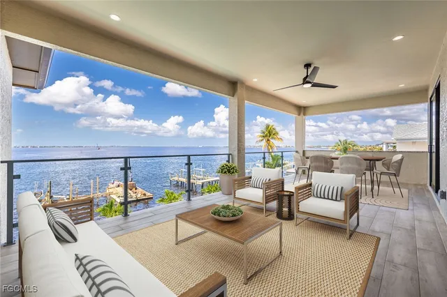 a view of a balcony with wooden floor and outdoor space