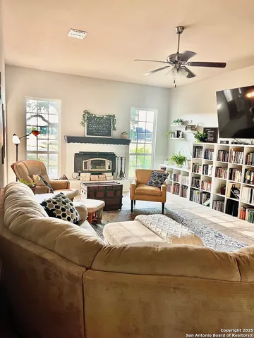 a bedroom with bed and a window