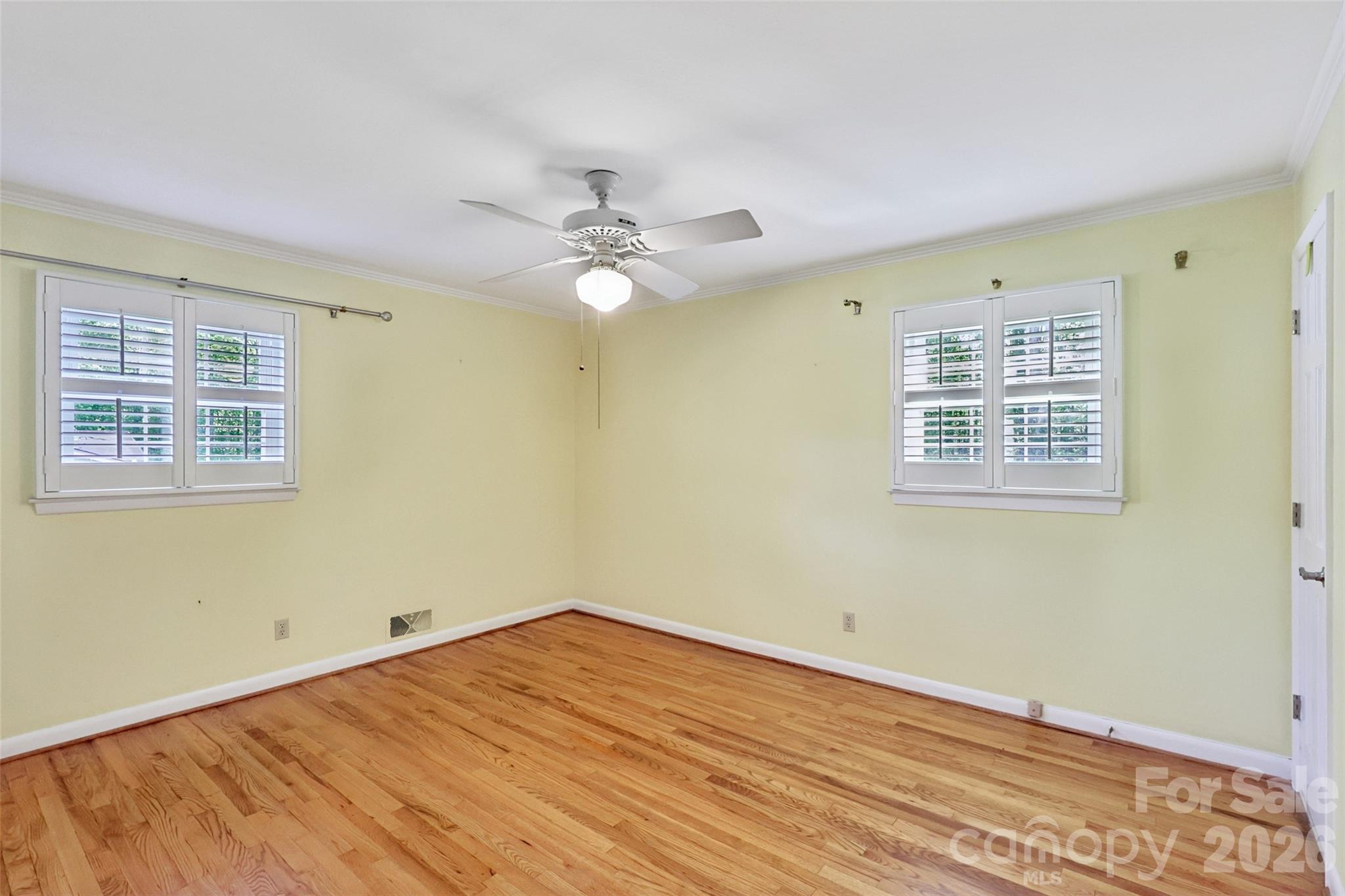 1002 Ridge Street Albemarle, NC 28001 - Photo 21 of 45 a view of an empty room with a window