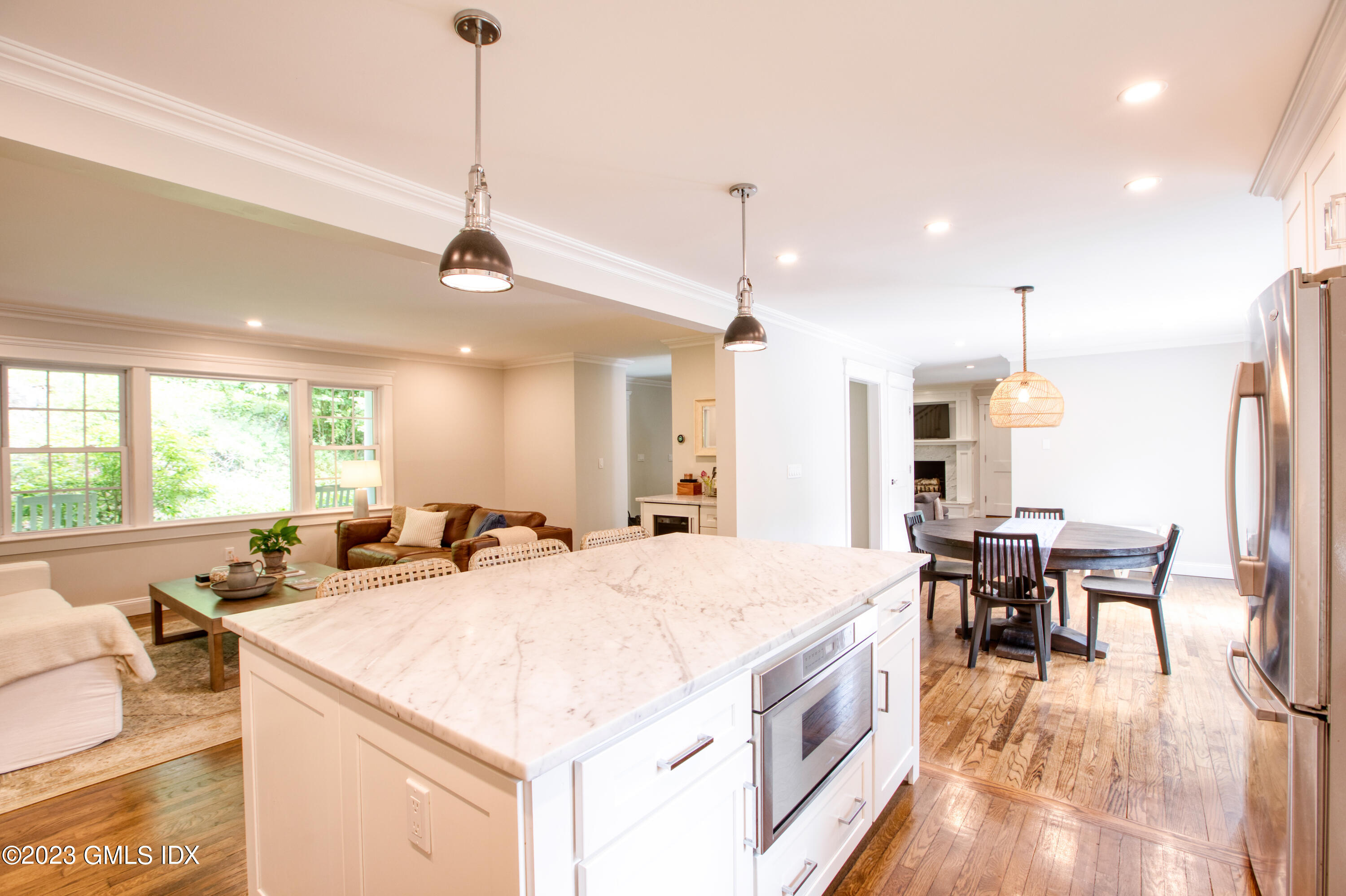 340 Webbs Hill Road Stamford, CT 06903 - Photo 11 of 36 a large kitchen with kitchen island a large island in it