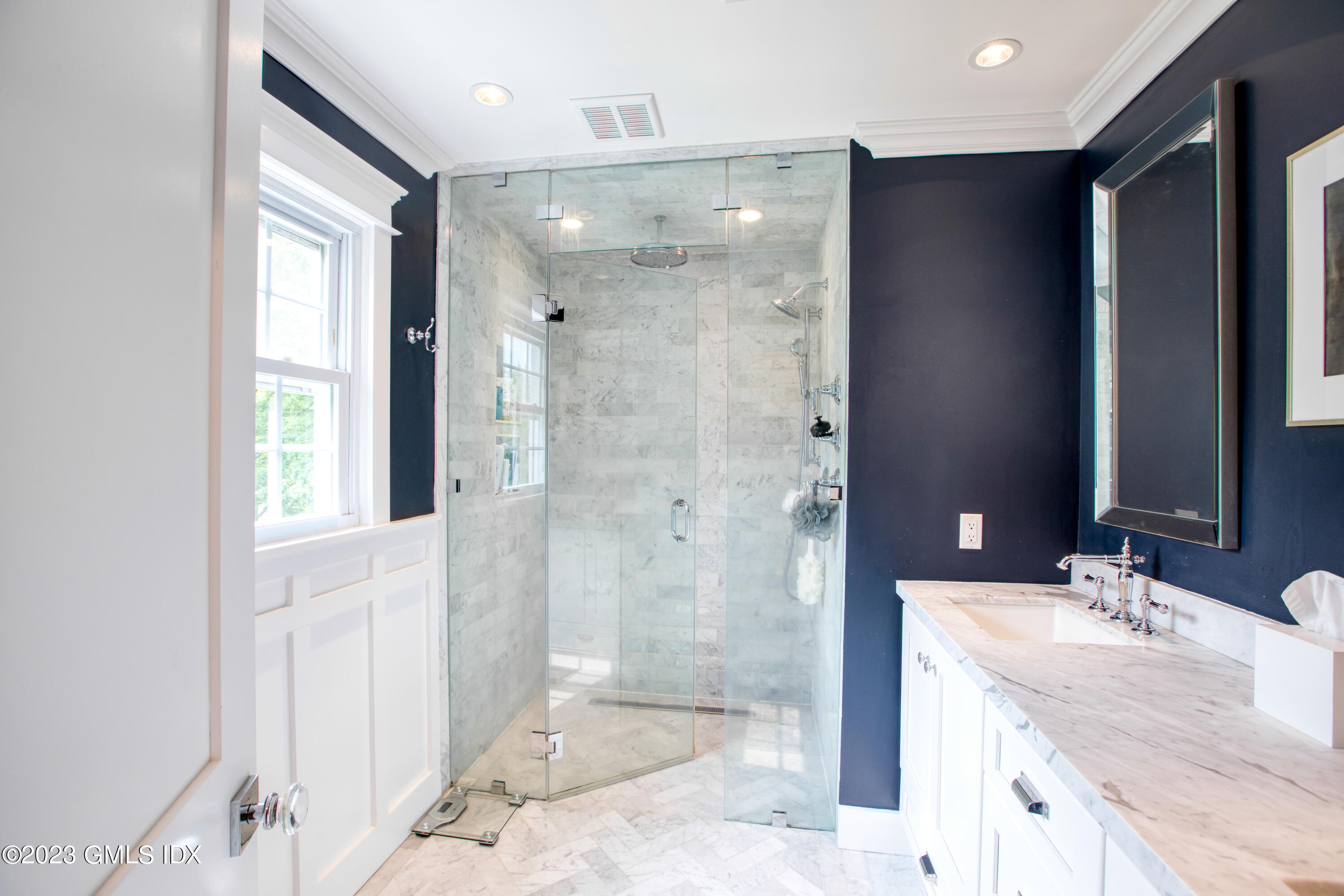 340 Webbs Hill Road Stamford, CT 06903 - Photo 23 of 36 a bathroom with a granite countertop sink mirror and shower