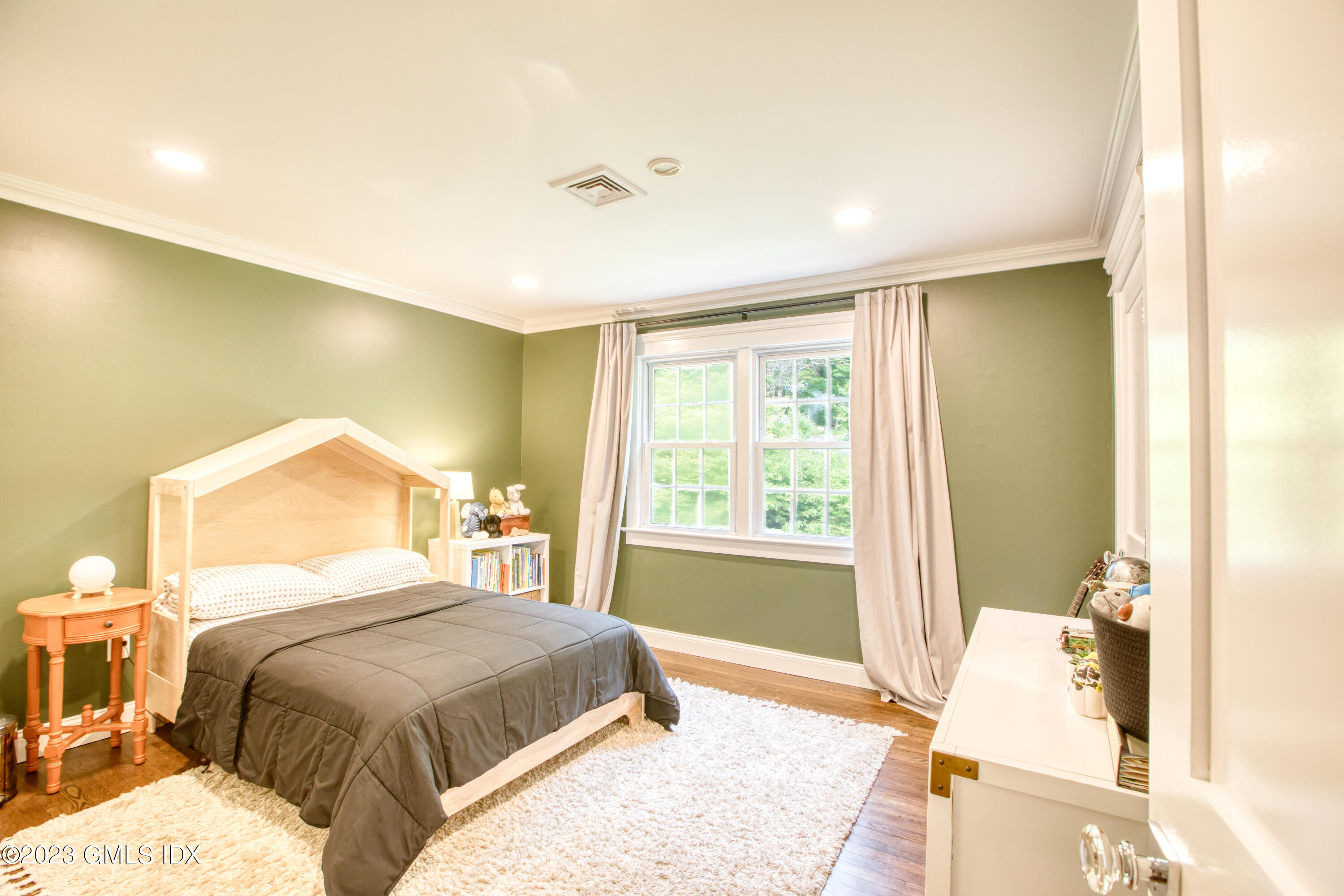 340 Webbs Hill Road Stamford, CT 06903 - Photo 26 of 36 a bedroom with a bed and a window