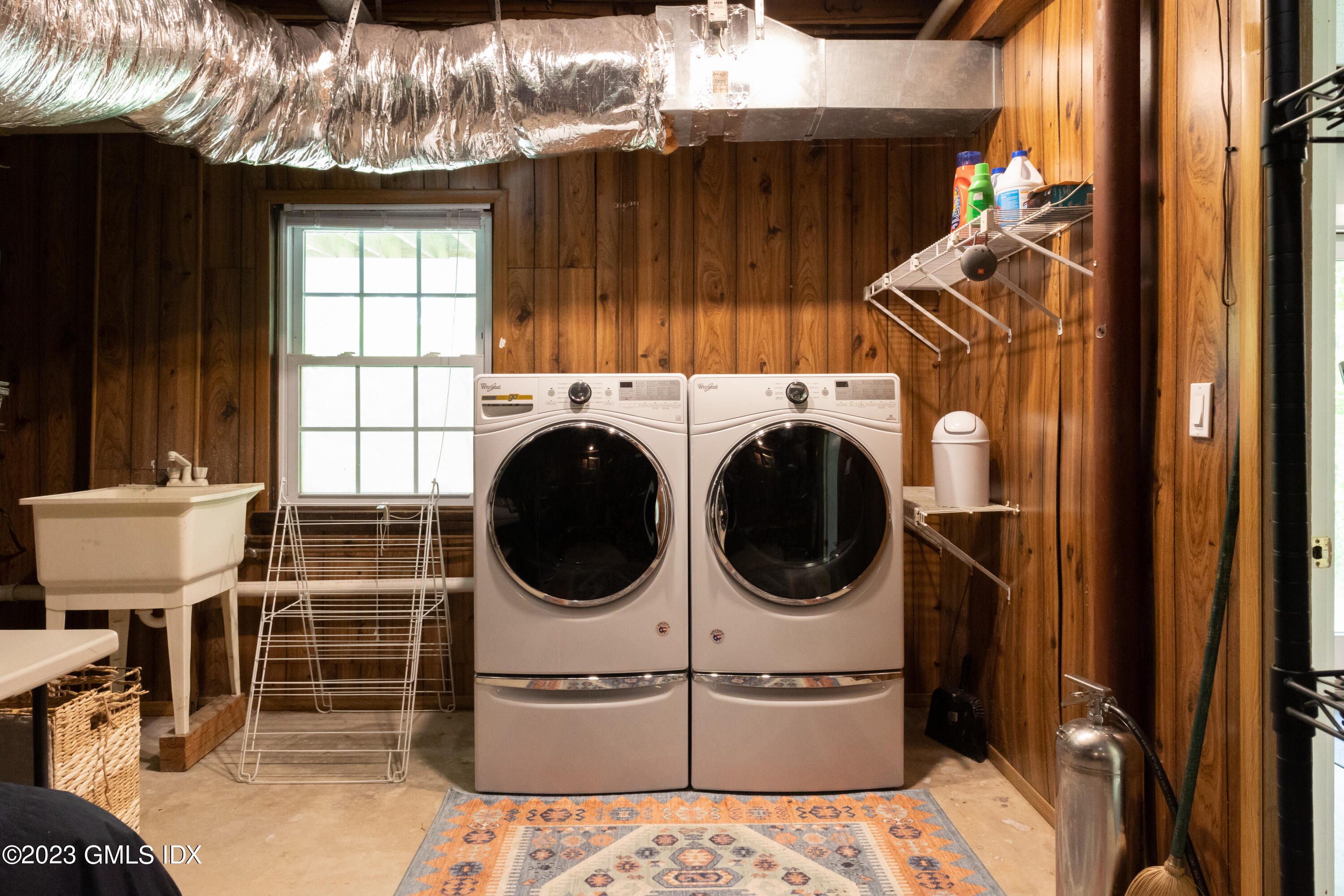 340 Webbs Hill Road Stamford, CT 06903 - Photo 33 of 36 a utility room with dryer and washer