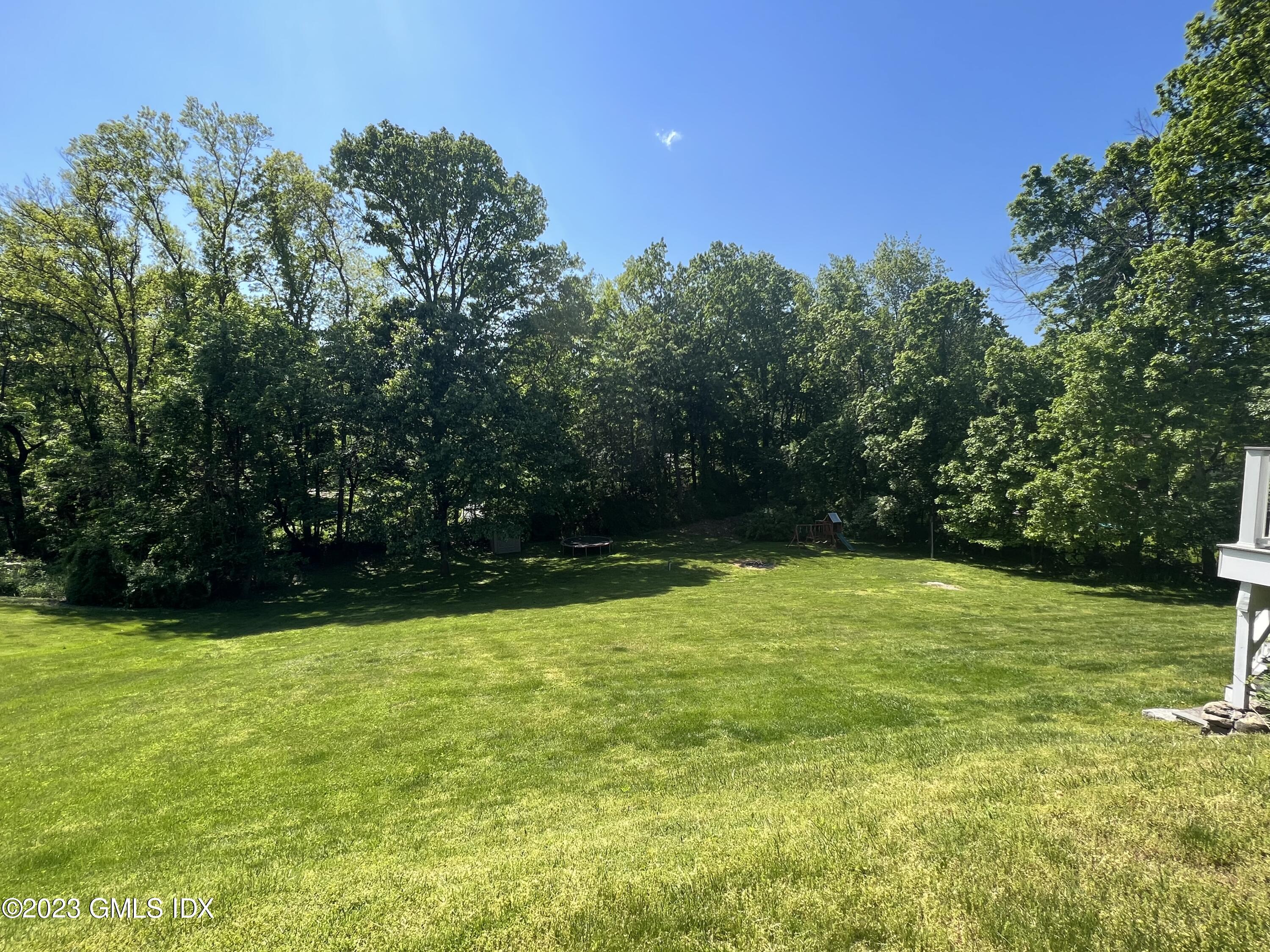 340 Webbs Hill Road Stamford, CT 06903 - Photo 35 of 36 a view of a pool with a yard