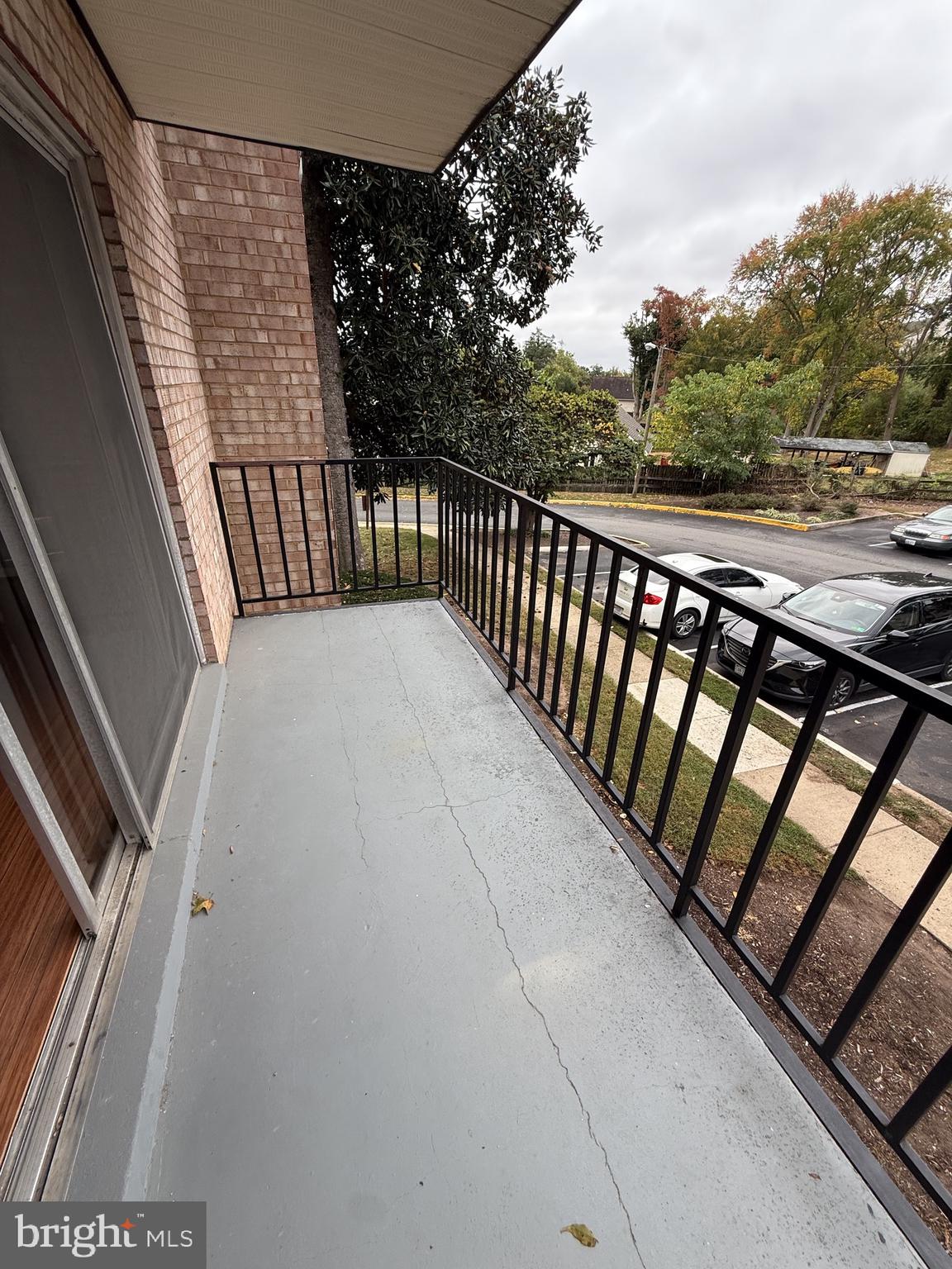 12650 Dara Drive, Unit 204 Woodbridge, VA 22192 - Photo 11 of 12 a view of balcony with wooden floor