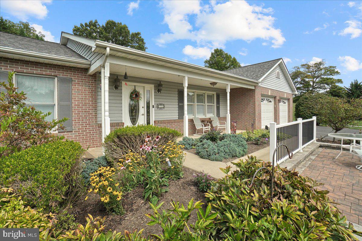 28620 Clarksburg Road Damascus, MD 20872 - Photo 66 of 79 Beautiful Landscaping embracing the Porch!