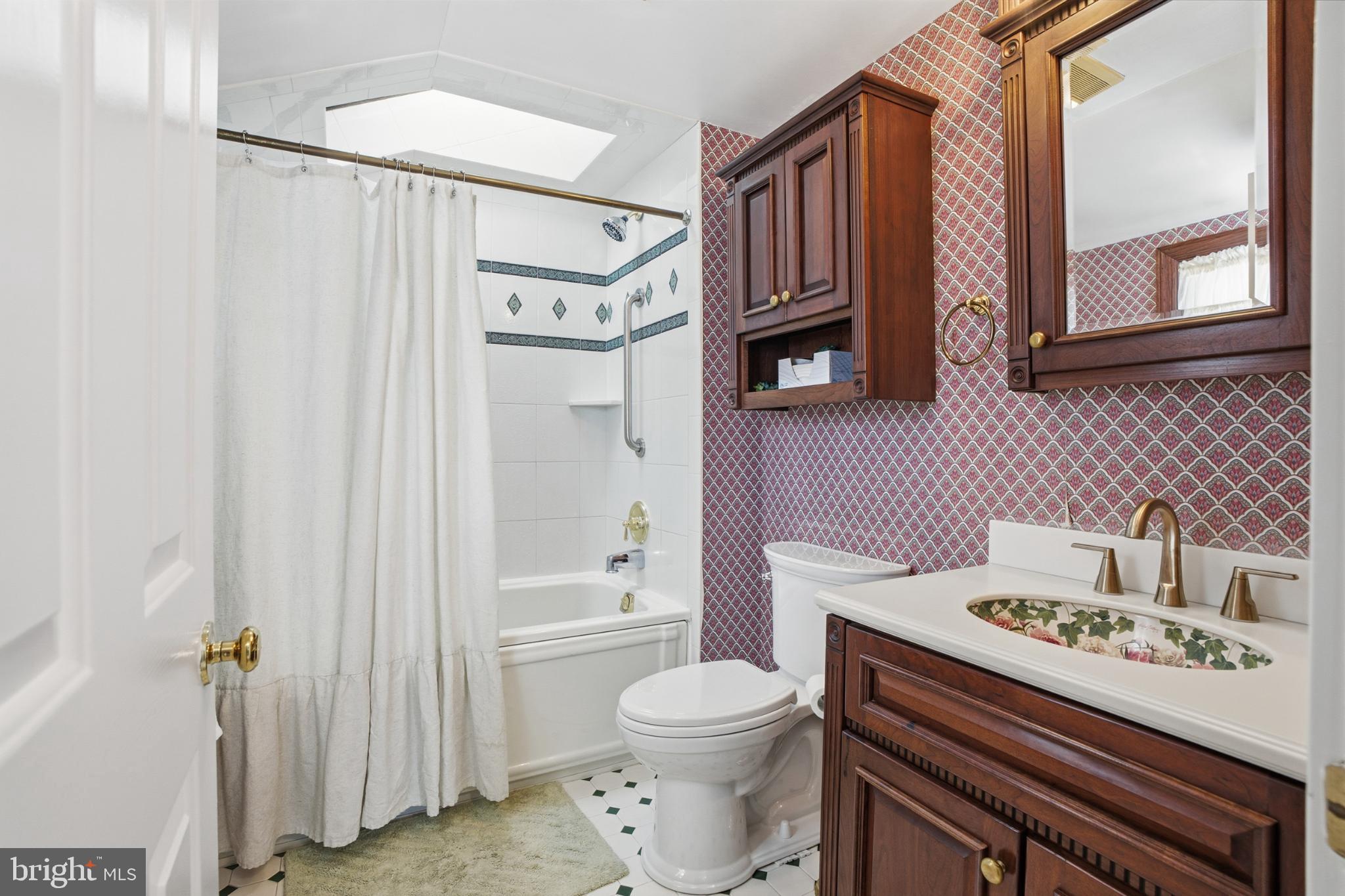 301 North 3rd Street Telford, PA 18969 - Photo 20 of 47 Hall bathroom with vintage elegance.