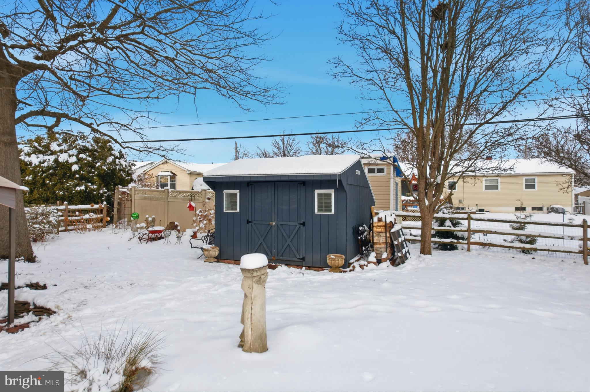 301 North 3rd Street Telford, PA 18969 - Photo 33 of 47 Charming winter scene with a cozy shed.