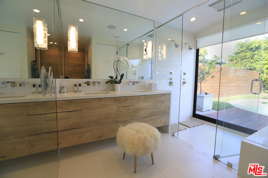 2652 Byron Place Los Angeles, CA 90046 - Photo 12 of 15 a bathroom with a double vanity sink mirror and double