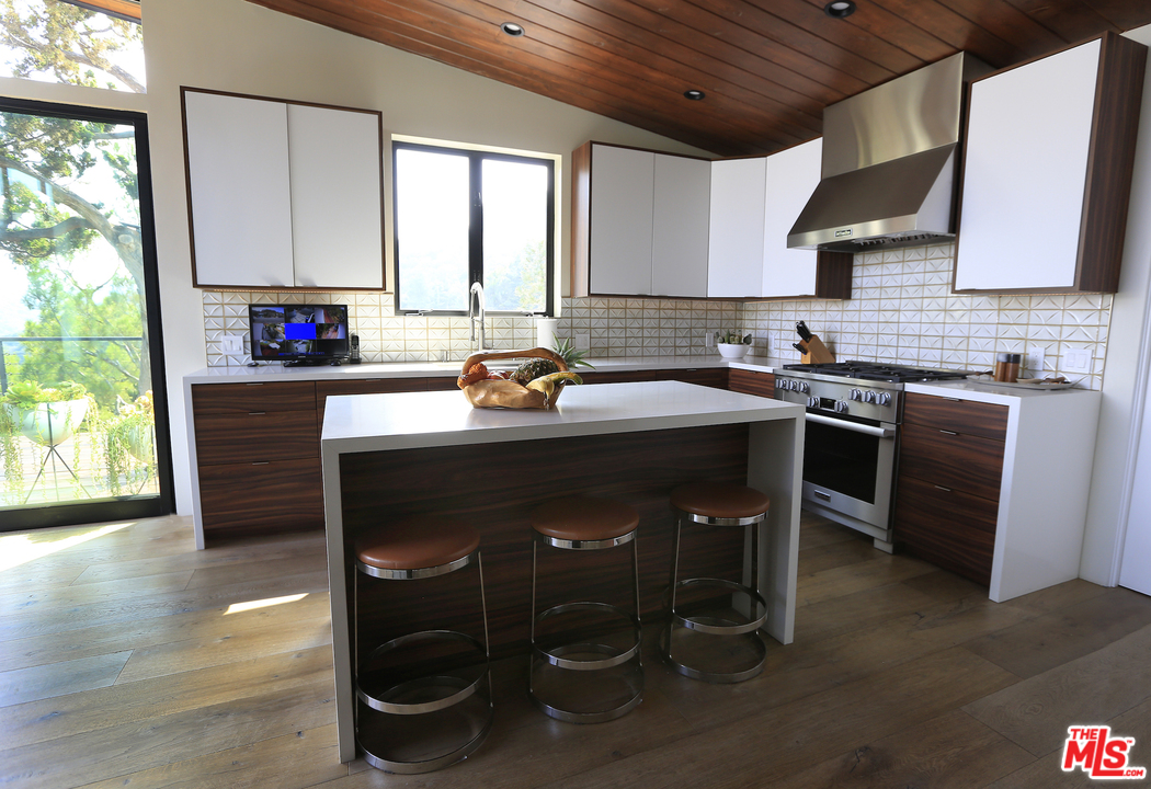2652 Byron Place Los Angeles, CA 90046 - Photo 5 of 15 a kitchen with a sink appliances and cabinets