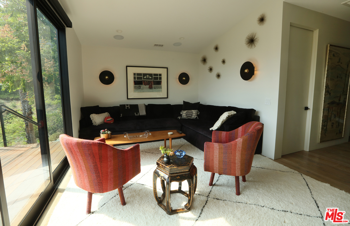 2652 Byron Place Los Angeles, CA 90046 - Photo 8 of 15 a living room with furniture and a large window