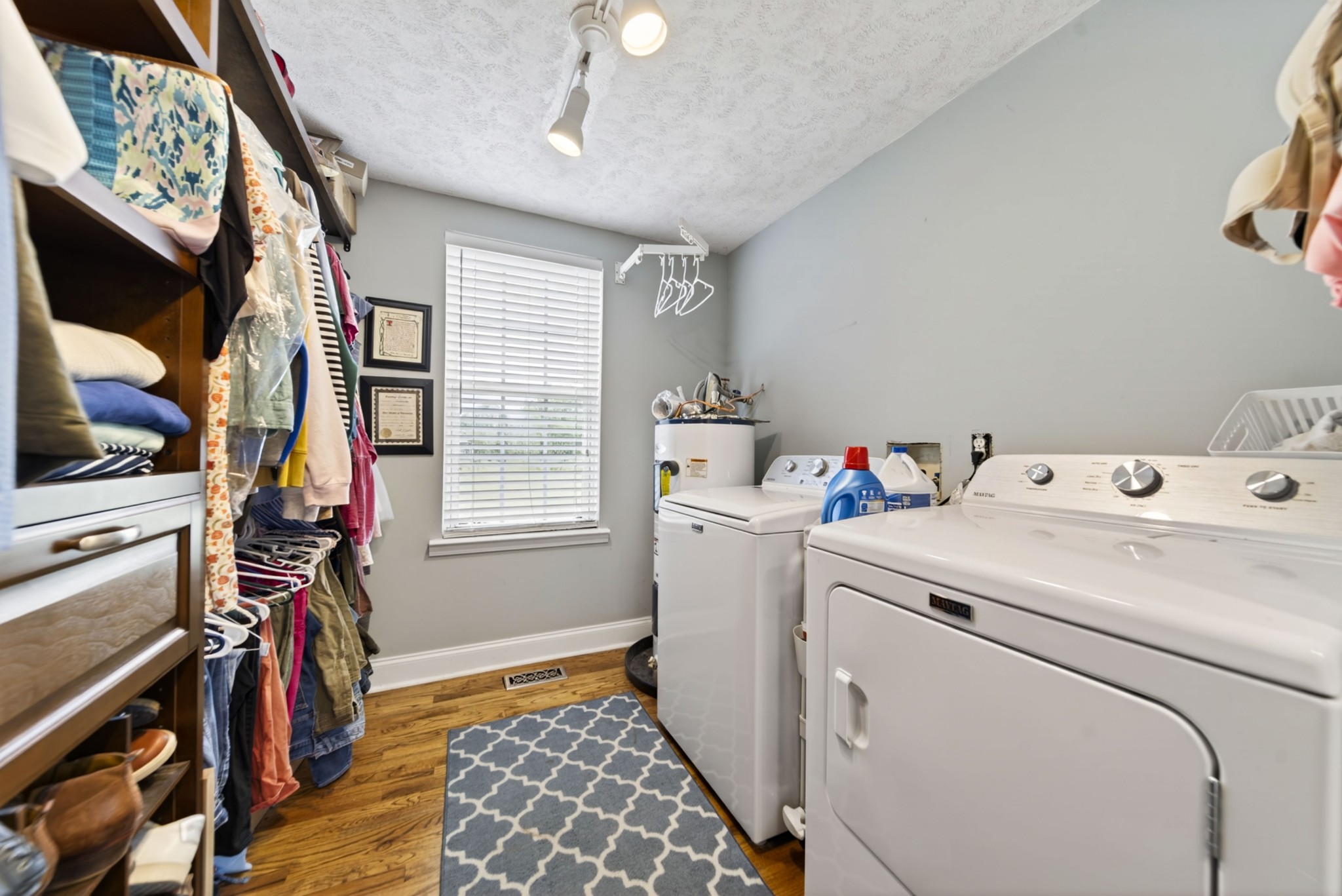 8023 Bethlehem Road Springfield, TN 37172 - Photo 45 of 55 a storage room with washer and dryer