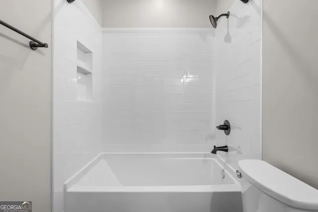 a bathroom with a bathtub