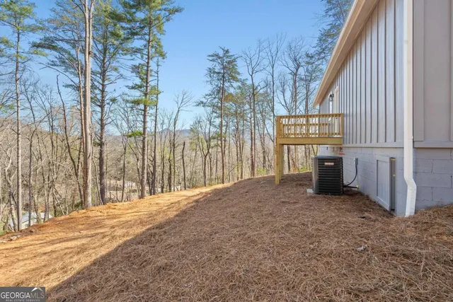 a view of a backyard of the house