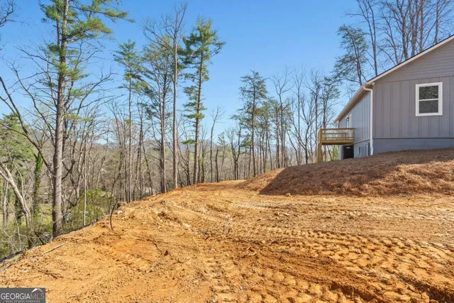 a view of a backyard of snow