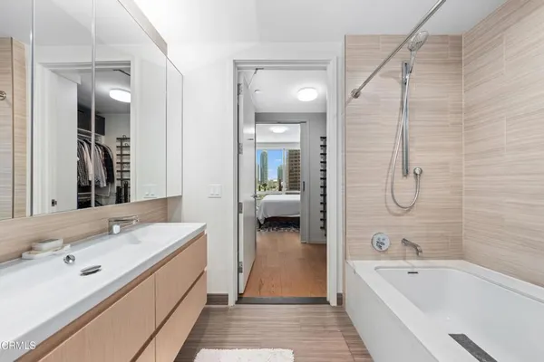 a view of a hallway with washer and dryer
