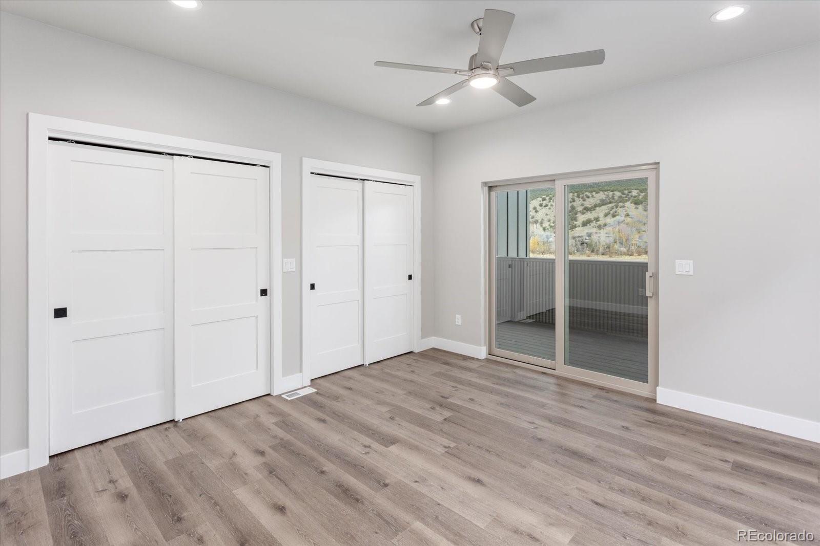 128 Southside Loop Salida, CO 81201 - Photo 13 of 20 an empty room with closet and a ceiling fan