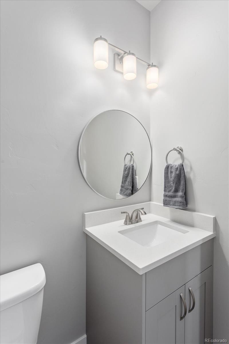 128 Southside Loop Salida, CO 81201 - Photo 7 of 20 a bathroom with a sink and a toilet