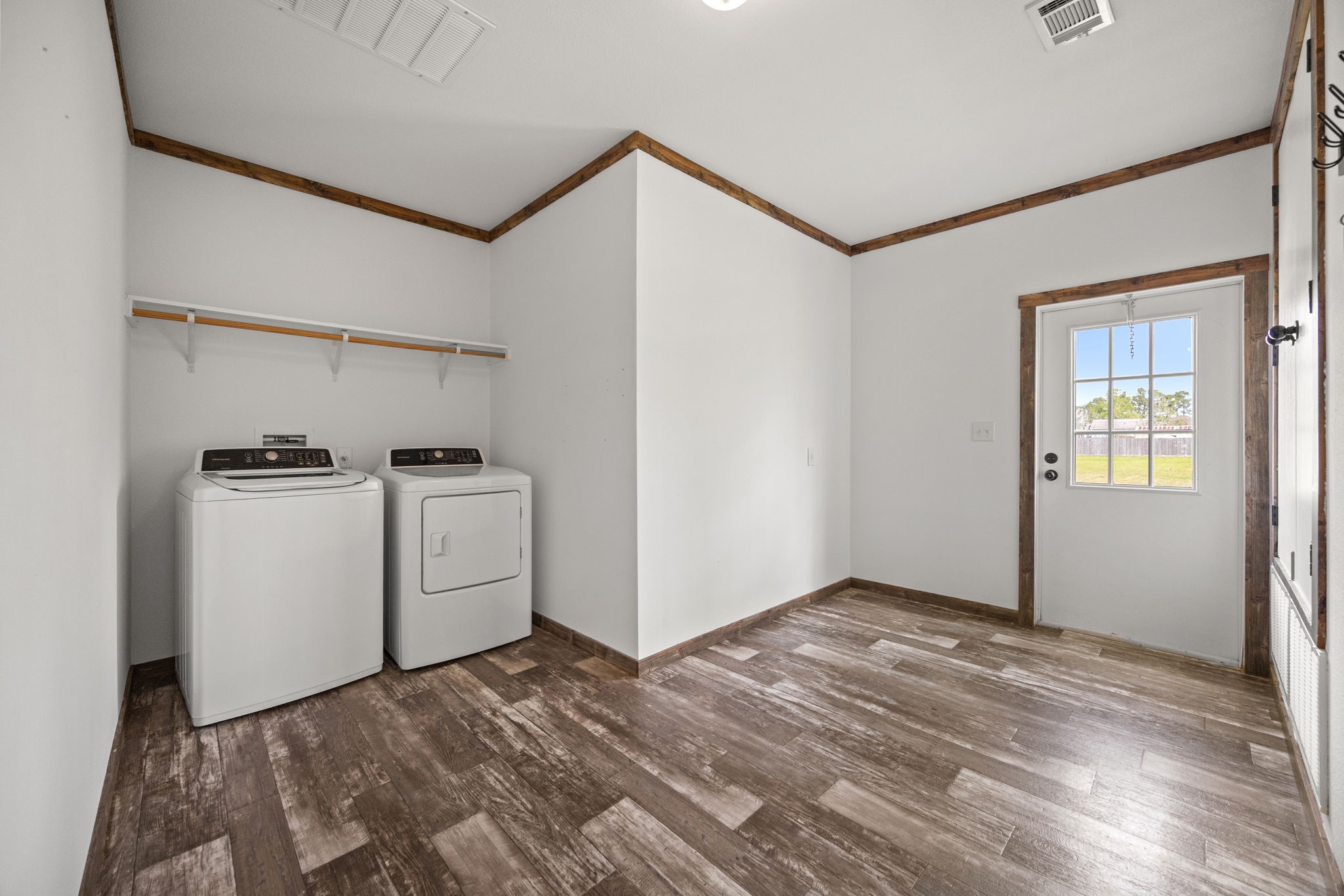 12708 28th Street Santa Fe, TX 77510 - Photo 12 of 29 a view of a storage & utility room with closet window