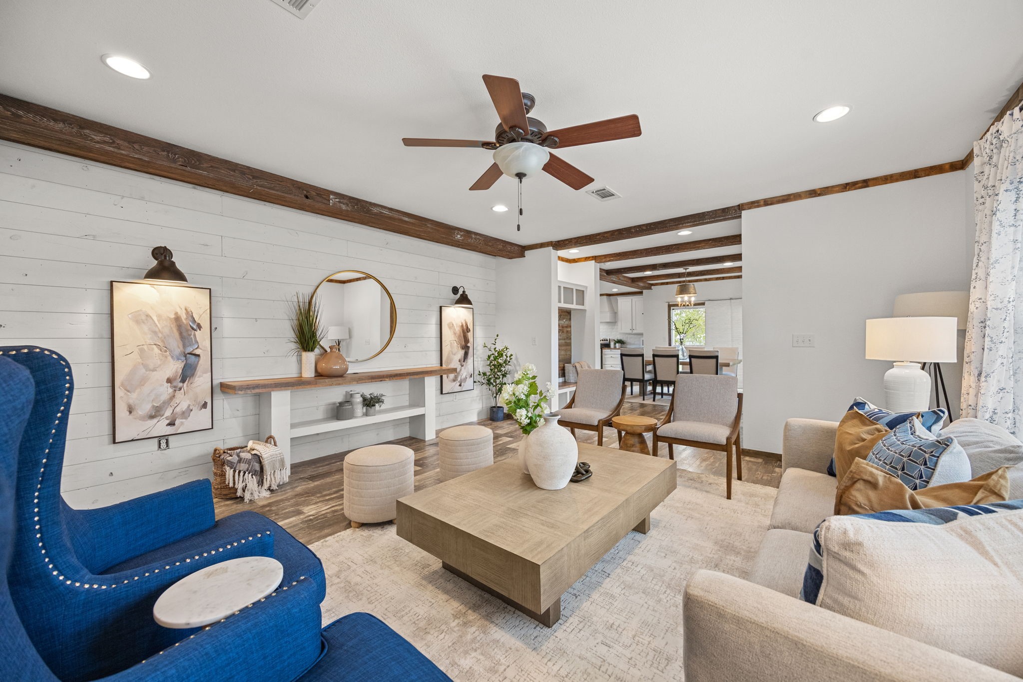 12708 28th Street Santa Fe, TX 77510 - Photo 15 of 29 a living room with furniture and a chandelier