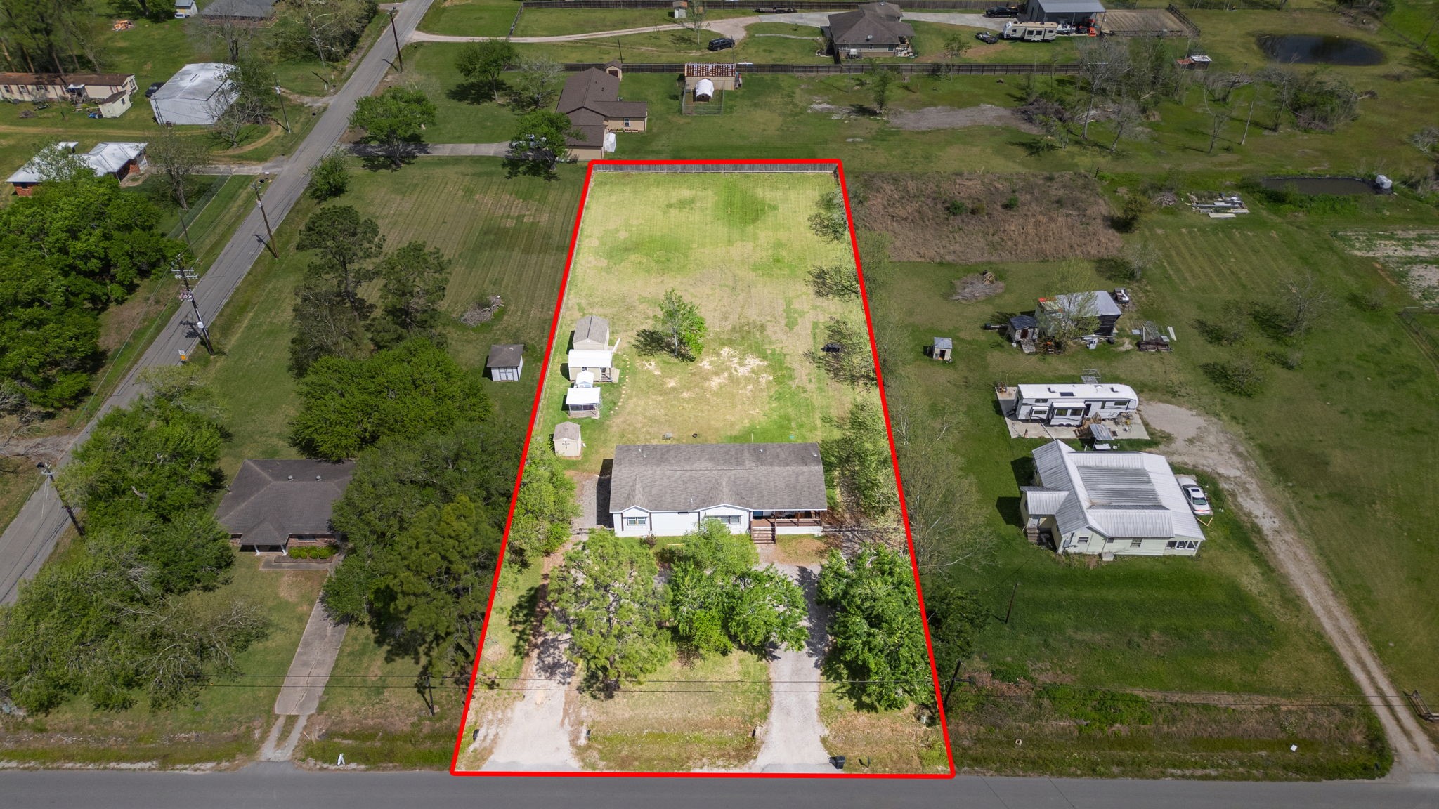 12708 28th Street Santa Fe, TX 77510 - Photo 28 of 29 an aerial view of a residential houses with outdoor space