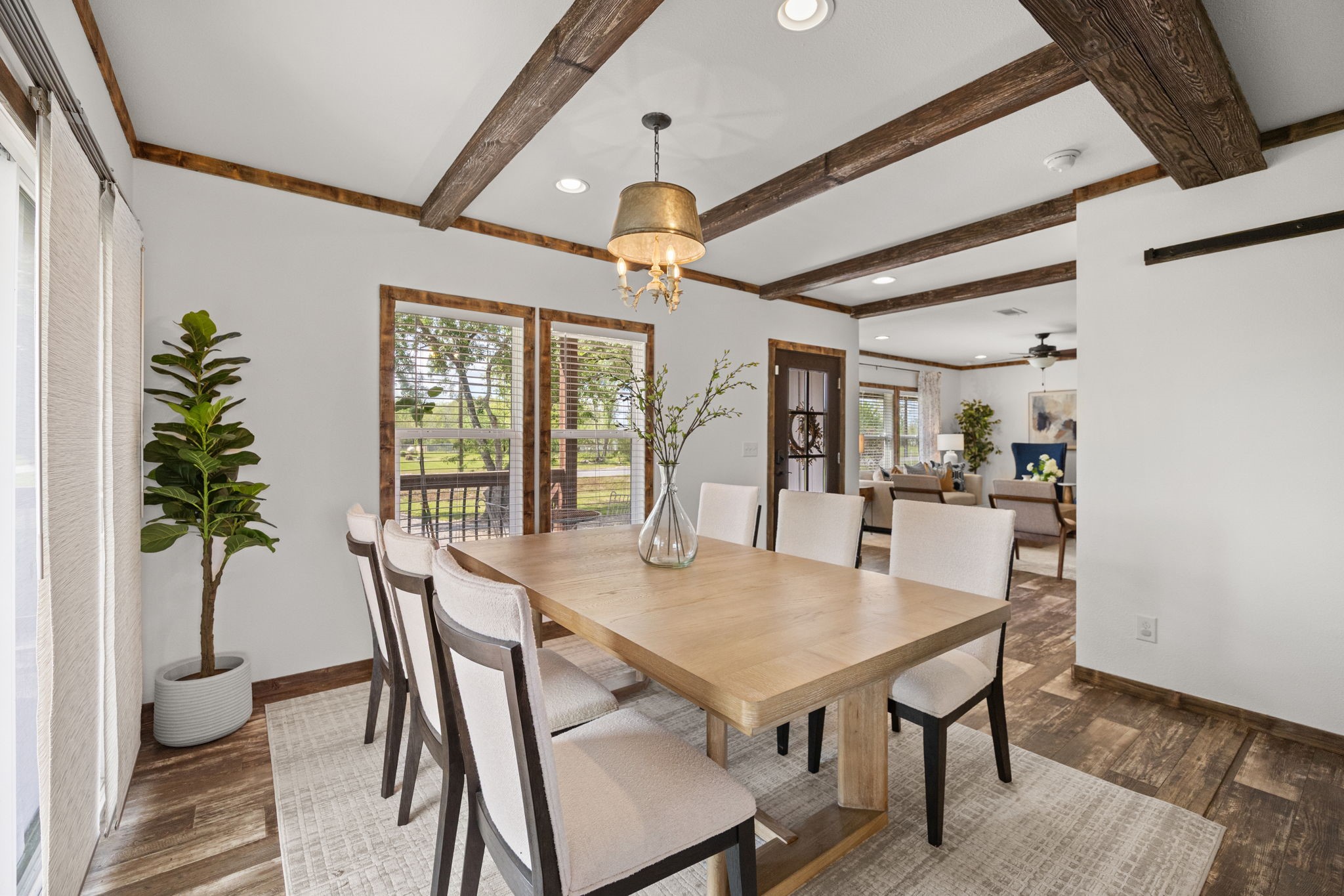 12708 28th Street Santa Fe, TX 77510 - Photo 6 of 29 a view of a dining room with furniture window and wooden floor