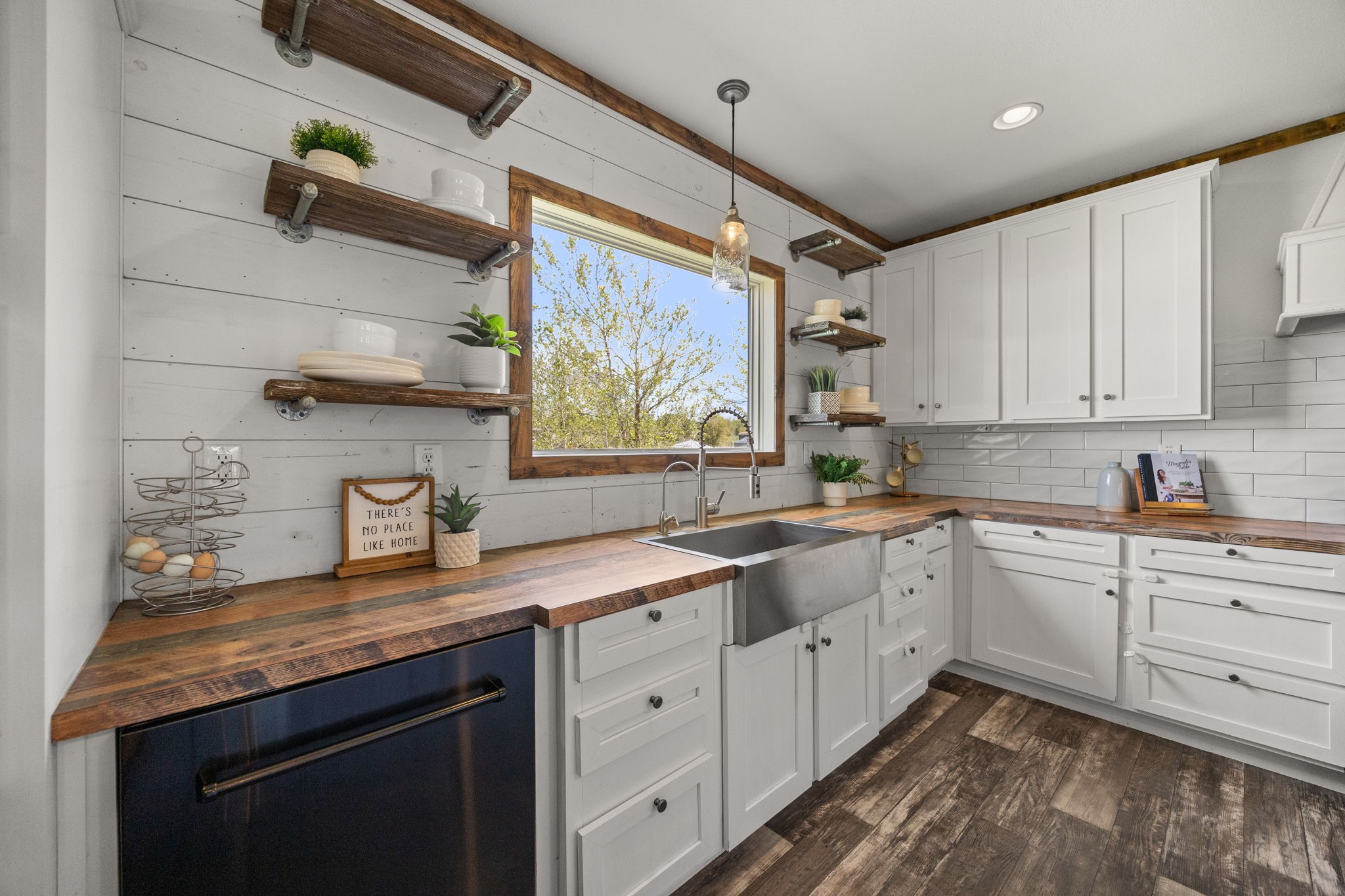 12708 28th Street Santa Fe, TX 77510 - Photo 10 of 29 a kitchen with sink cabinets and window