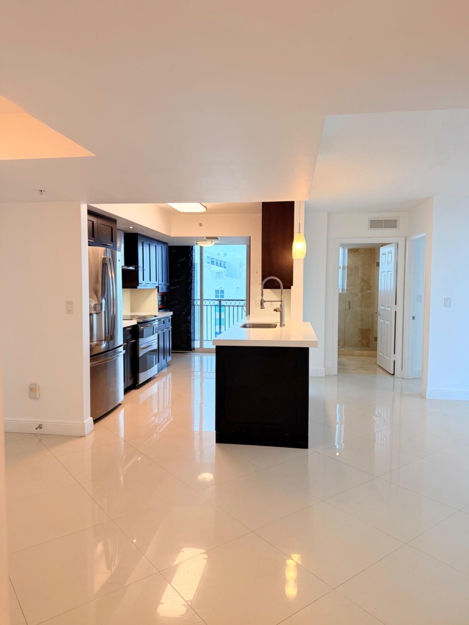 3232 Coral Way, Unit 1601 Miami, FL 33145 - Photo 3 of 27 a view of living room with furniture and a kitchen