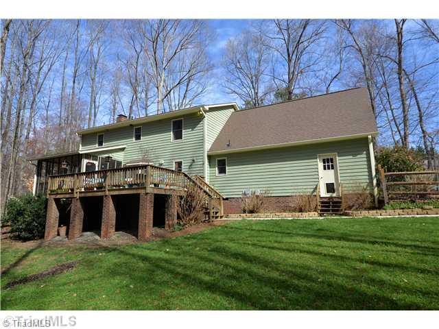 4903 Golden Oaks Drive Oak Ridge, NC 27310 - Photo 2 of 15 Exterior Back.
