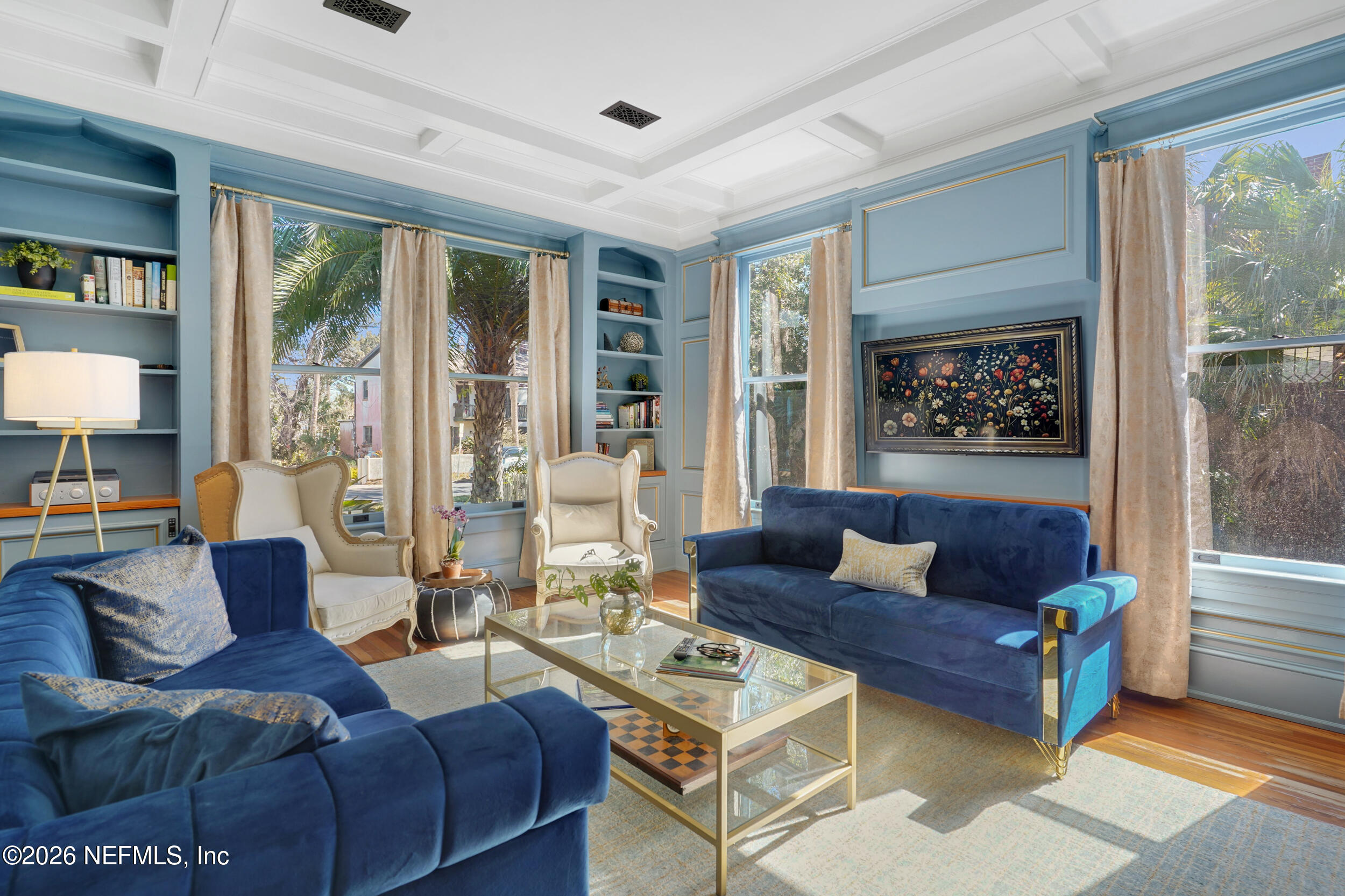 290 St George Street, Unit A St. Augustine, FL 32084 - Photo 6 of 32 a living room with furniture and a large window