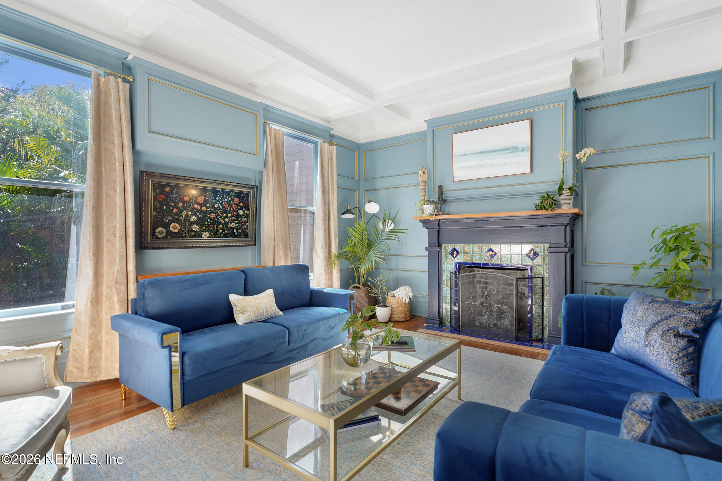 290 St George Street, Unit A St. Augustine, FL 32084 - Photo 8 of 32 a living room with furniture and a fireplace