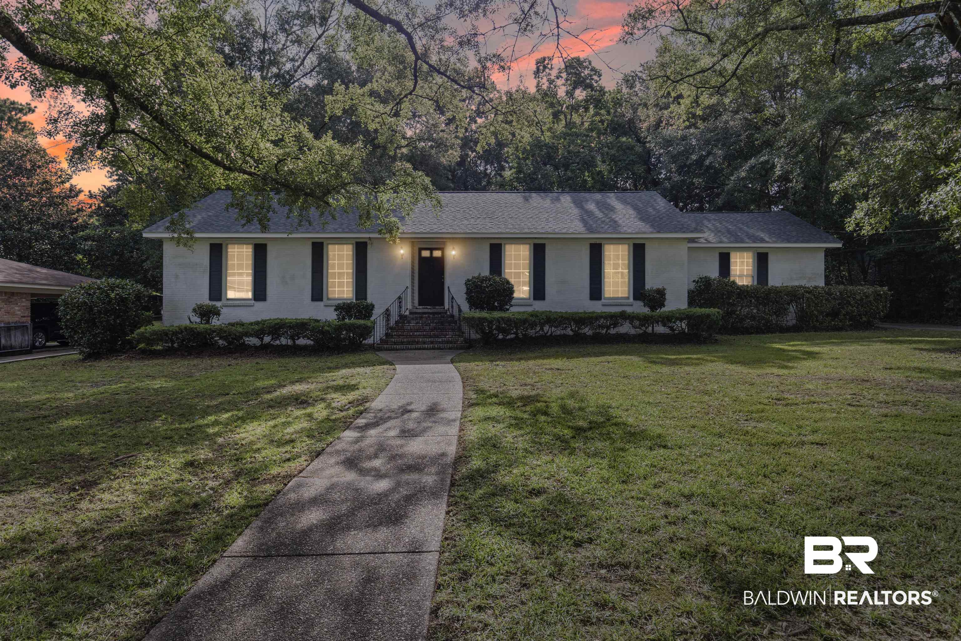 1108 Locarno Street Mobile, AL 36608 - Photo 2 of 24 Single story home featuring a lawn and roof with shingles