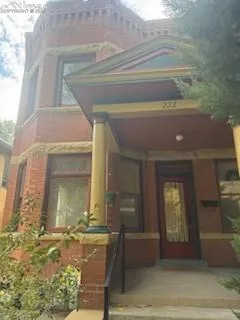 a front view of a house with a garage