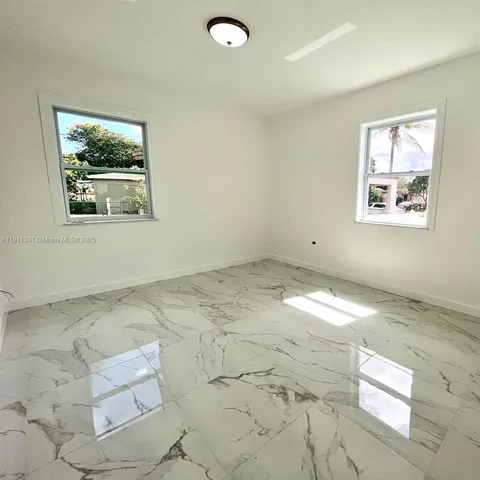 a view of a livingroom with a window