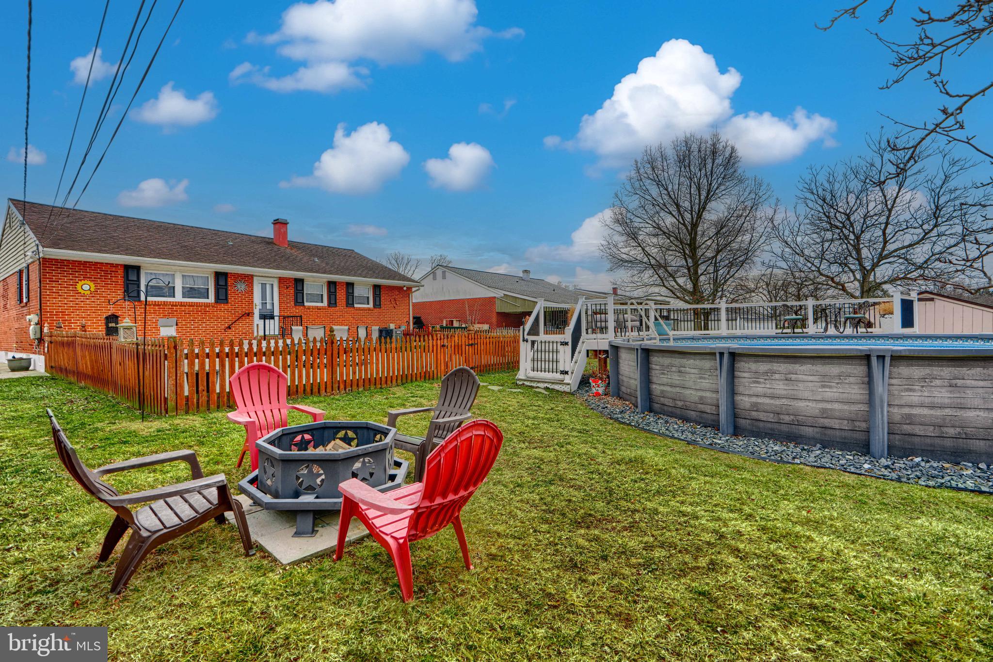 9518 Holiday Manor Road Baltimore, MD 21236 - Photo 5 of 8 a view of a chairs and tables in the patio