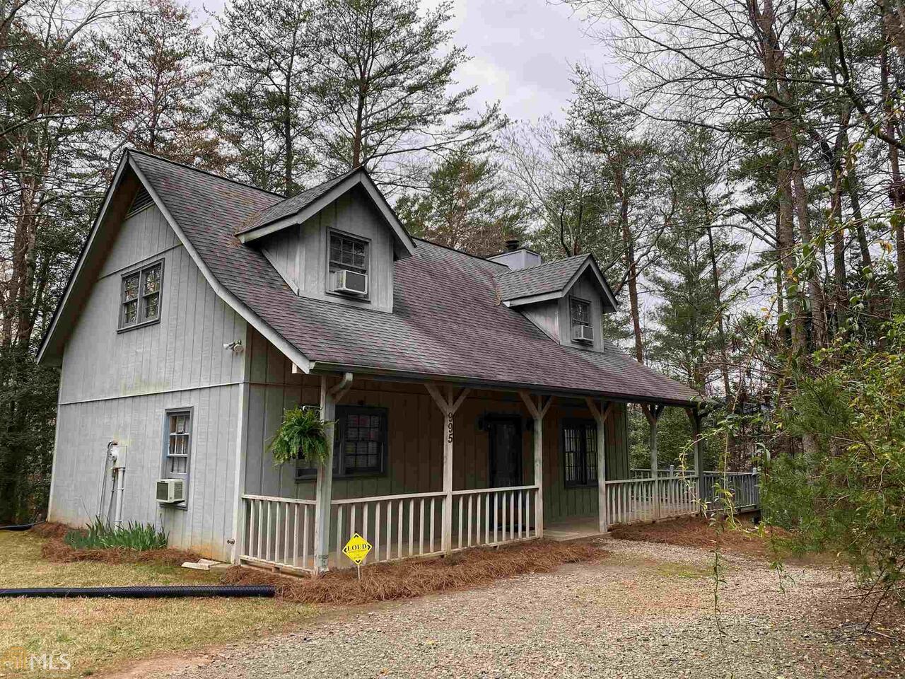 995 Paradise Valley Road Cleveland, GA 30528 - Photo 1 of 1 a front view of a house with a porch