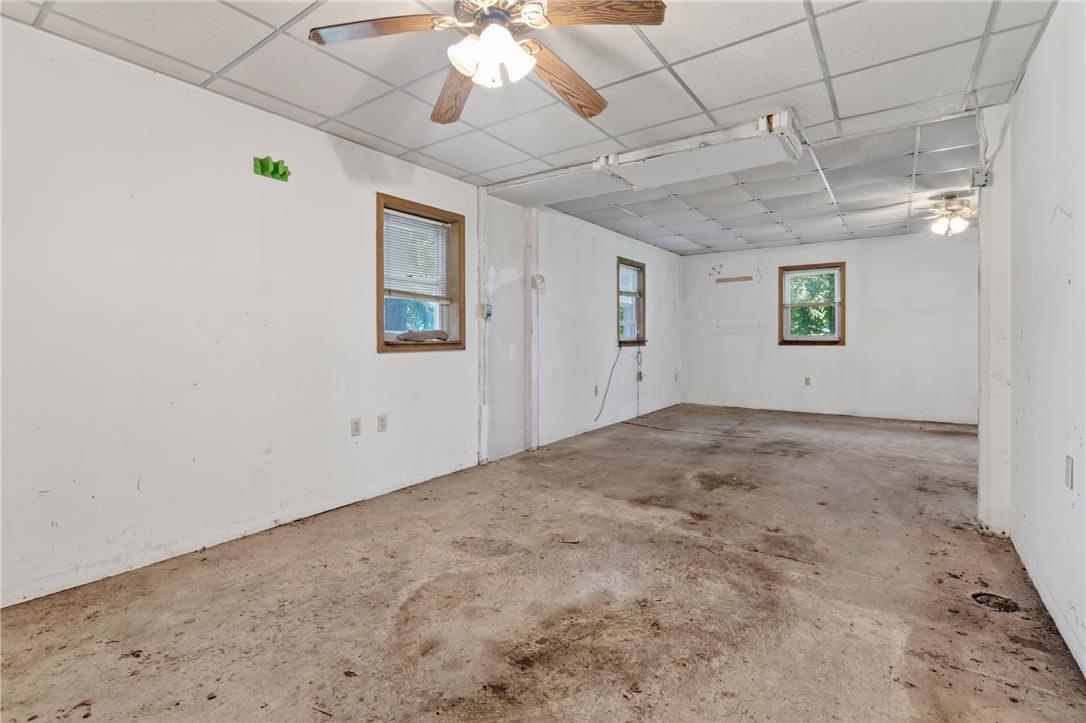 51 Reynolds Road Tamaqua, PA 18252 - Photo 50 of 71 Concrete floors and windows illuminate this spacious room with opportunity.