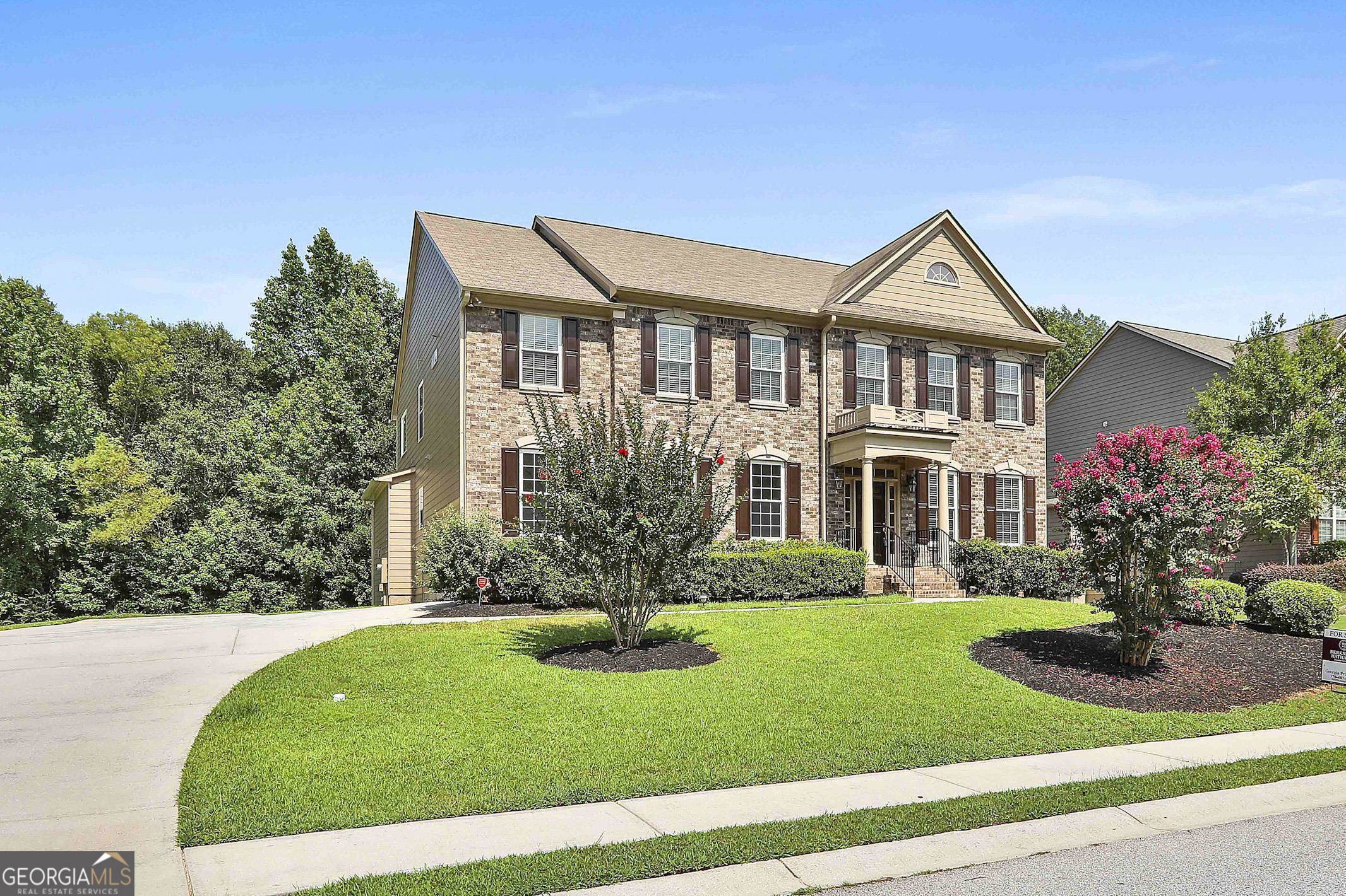113 Westmont Way Tyrone, GA 30290 - Photo 3 of 64 a front view of a house with a yard