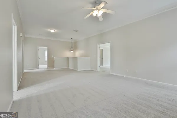 a view of a room with racks on the wall