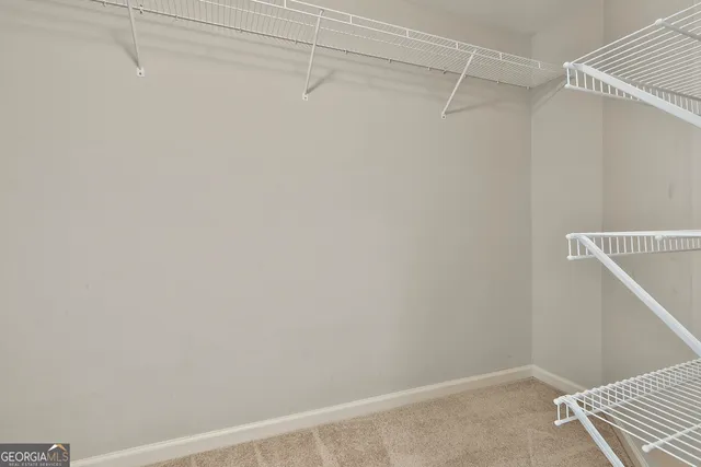 a view of a balcony with a large window