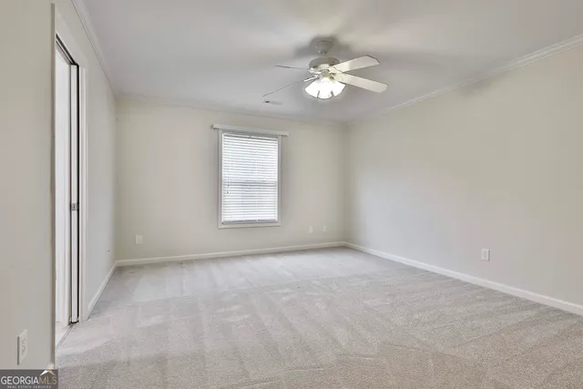 a view of a backyard with swimming pool