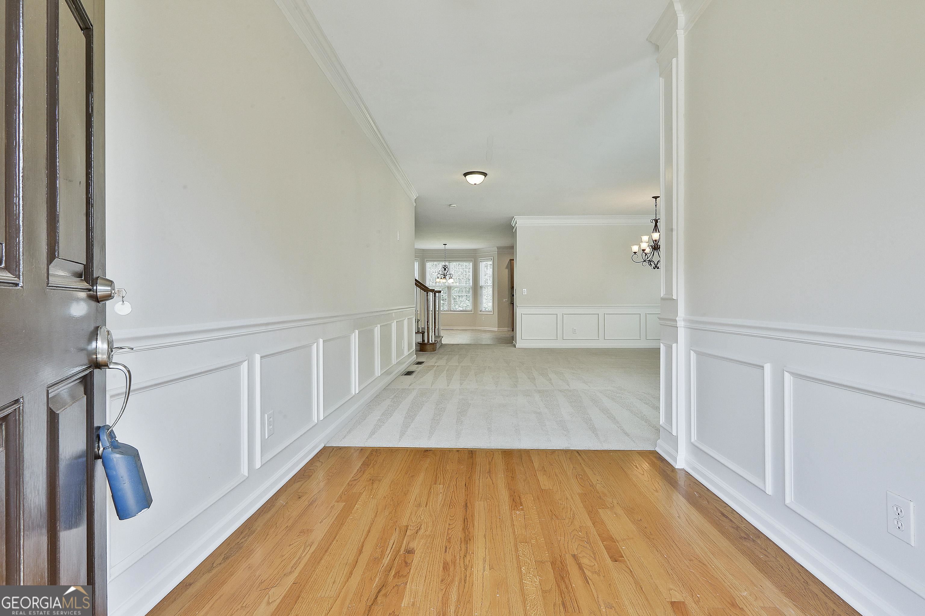 113 Westmont Way Tyrone, GA 30290 - Photo 7 of 64 a view of a room with wooden floor and staircase