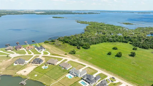 a view of a lake with a big yard